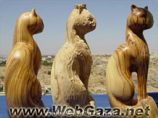 Olivewood Carving - Olivewood is a local material found throughout Palestine, and the wood carving can be traced back to the 16th and 17th centuries.
