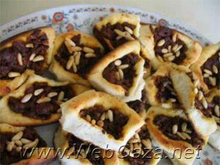 Sfeeha (Meat Pies) - Meat pies or Sfeeha is a popular snack that is prepared in the Middle Eastern kitchen. It has many variations of preparing and filling.